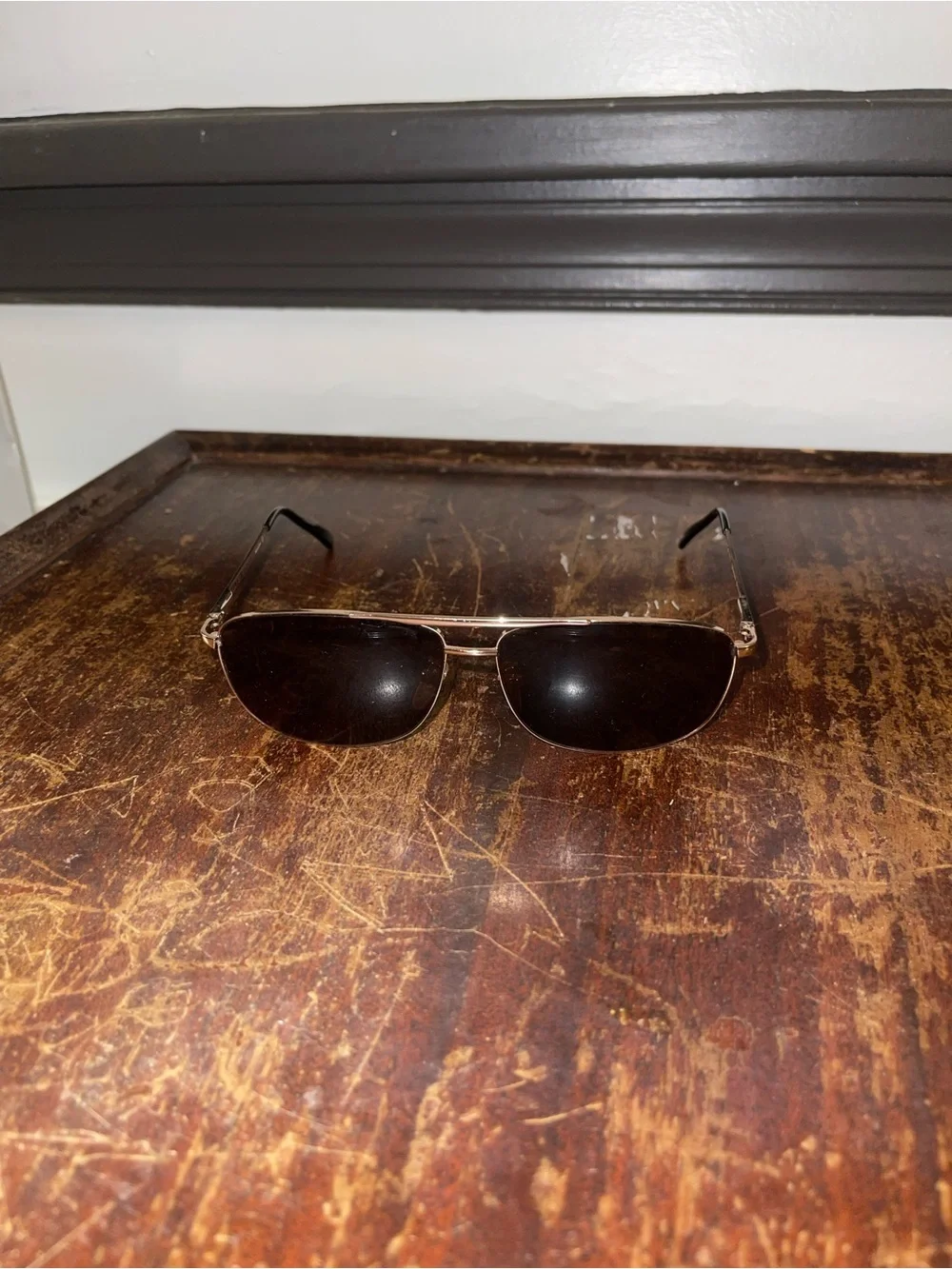 Tommy Hilfiger Men's Gold Frame Sunglasses with Dark Lenses